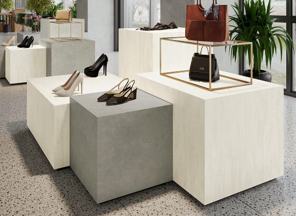 エイジド感があるモルタル調化粧板を使ったカウンター什器イメージ